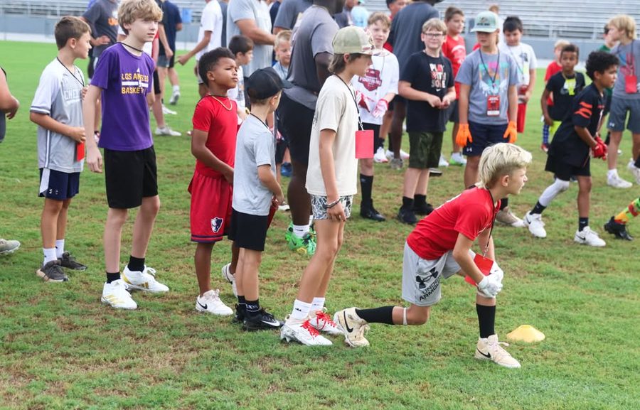 Camper practicing kicking at Future Mustangs camp